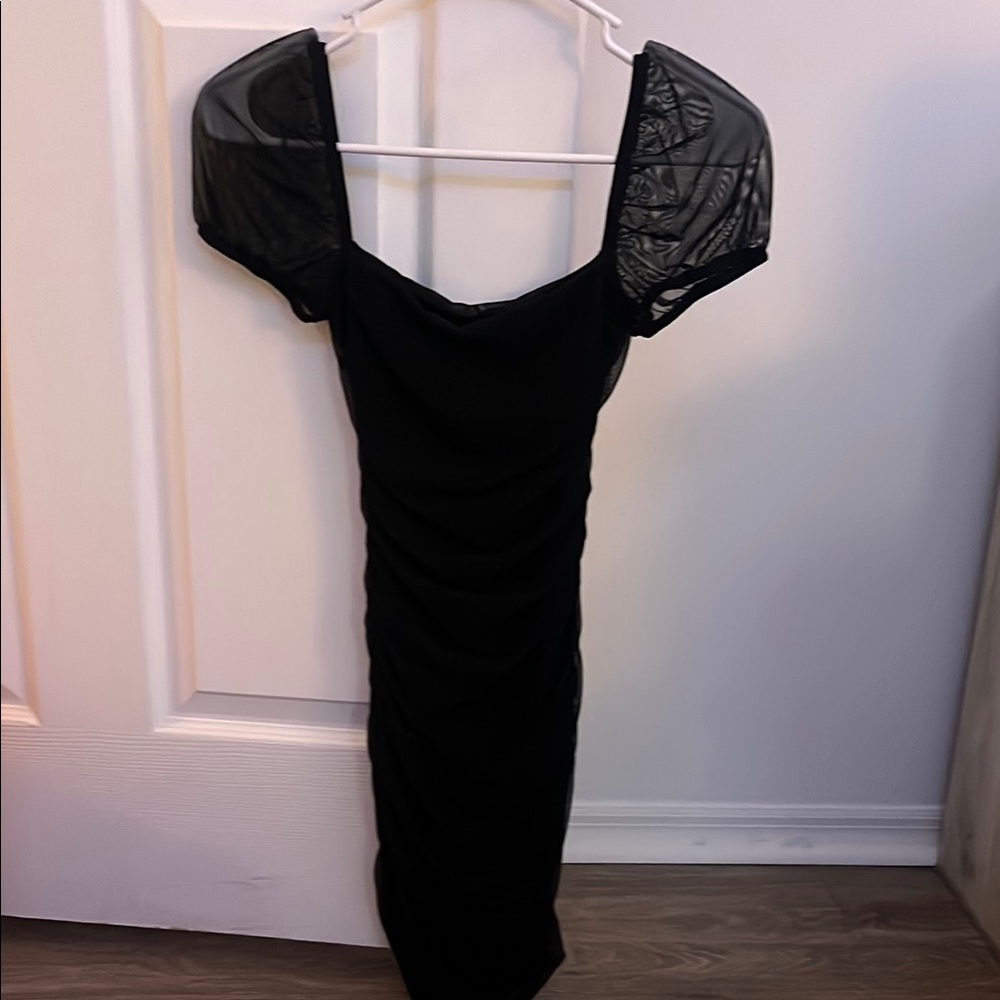 Elegant Black Dress with Sheer Sleeves